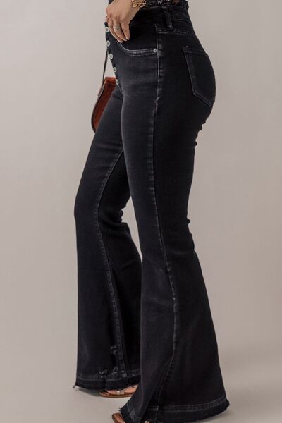 Button-Fly Flare Jeans with Pockets - Jenaklo  Crafted with expert precision, these Button-Fly Flare Jeans with Pockets offer a timeless and classic style. The button-fly design gives a secure fit while the flare leg elongates the silhouette. Complete with functional pockets for convenience, these jeans are a must-have for any wardrobe. Jenaklo #