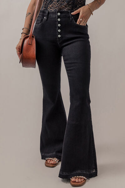 Button-Fly Flare Jeans with Pockets - Jenaklo  Crafted with expert precision, these Button-Fly Flare Jeans with Pockets offer a timeless and classic style. The button-fly design gives a secure fit while the flare leg elongates the silhouette. Complete with functional pockets for convenience, these jeans are a must-have for any wardrobe. Jenaklo #